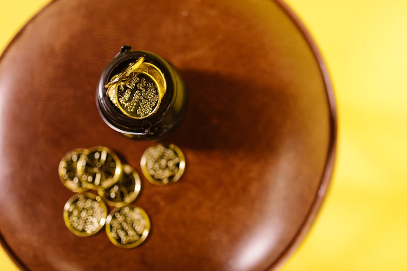 Gold coins arranged on a surface for selling