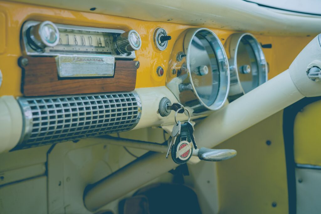 Car keys in an older vehicle dashboard